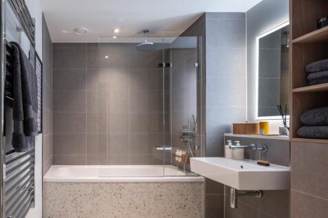 Experience luxury in this elegantly designed bathroom, perfect for relaxation.