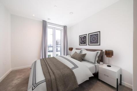 Experience tranquility in a modern bedroom filled with natural light.