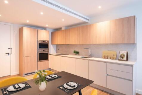 Experience contemporary living with this elegant kitchen, designed to blend functionality and style.