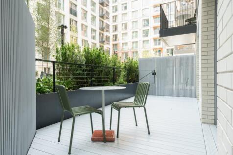 Experience a serene retreat on this chic urban balcony, perfect for relaxation and city views.