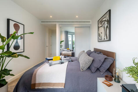 Experience comfort and sophistication in this beautifully designed bedroom.