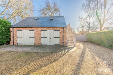 Double garage with room over