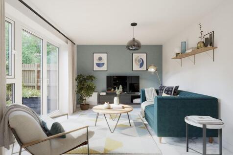 The cosy family room is located off the kitchen/dining area