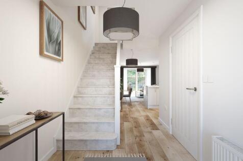 A welcoming hallway leading to the open plan kitchen &amp; dining area