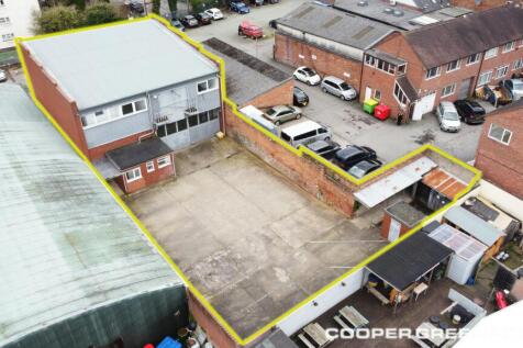 Silkmoor Drone Rear Elevation and Parking 4 Green Line.jpg