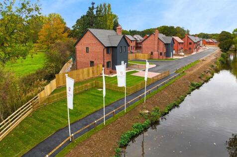 Plot with flagpoles and water.jpg
