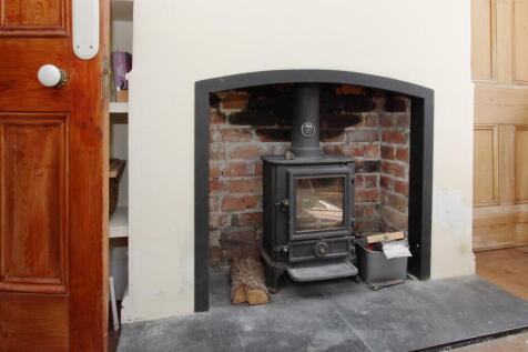 Log Burner in Dining Room