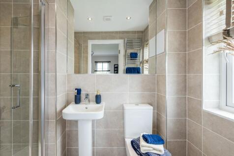 En suite shower room in Glenbervie show home
