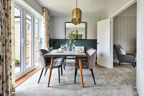 Double doors lead from the lounge to the dining area