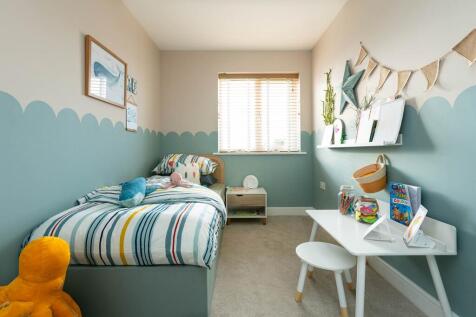 The third bedroom is well suited to a child&#39;s room or home office
