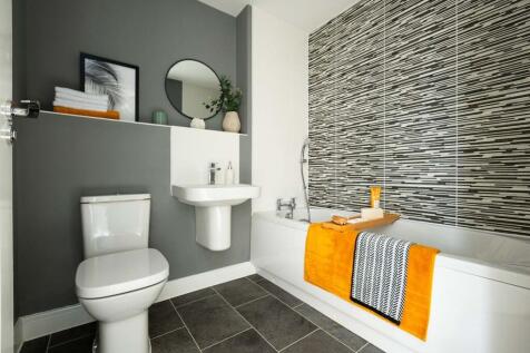 The family bathroom uses energy efficient fixtures to help lower your bills