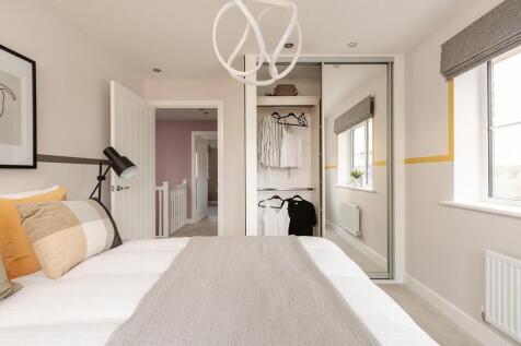 Bedroom 2 is ideal for guests &amp; includes built it wardrobes