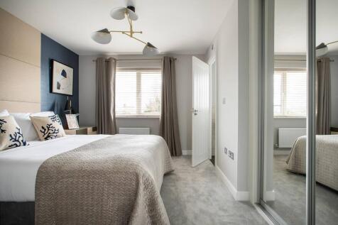 The main bedroom features an suite shower room for added luxury