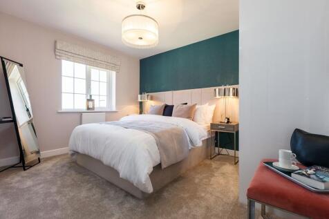 A generous second bedroom sits to the front of the home