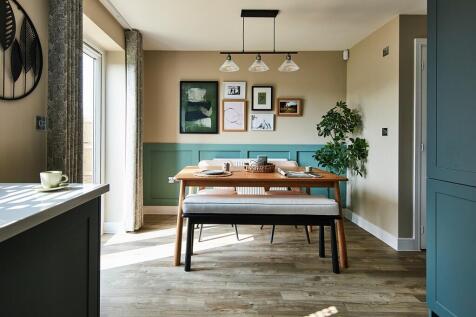 The kitchen/dining area is perfect for hosting a dinner party