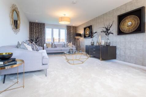 The lounge stretches the length of the house allowing space for everyone