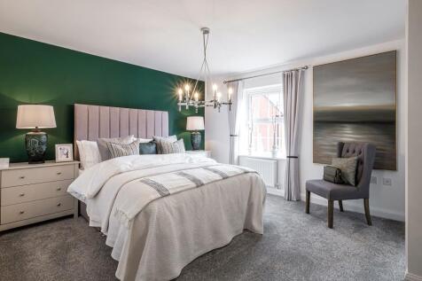 Hurst double bedroom with green feature wall