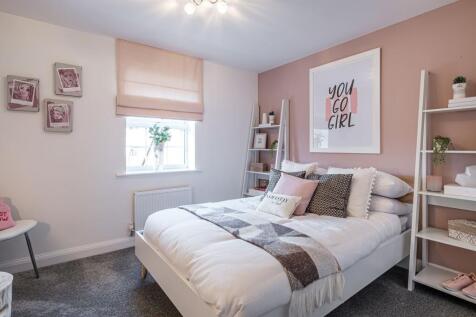 Hurst child&#39;s double bedroom with pink decor