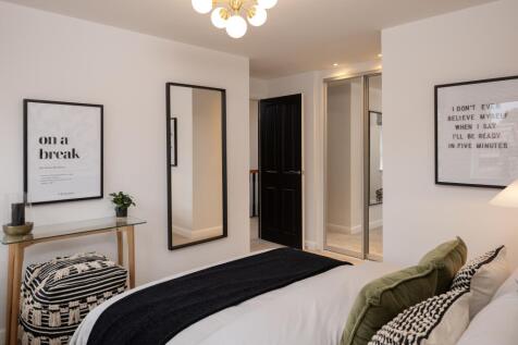 Second bedroom in the Holden 4 bedroom detached home