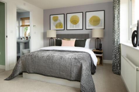 En suite main bedroom in the Kingsville. 4 bedroom home.