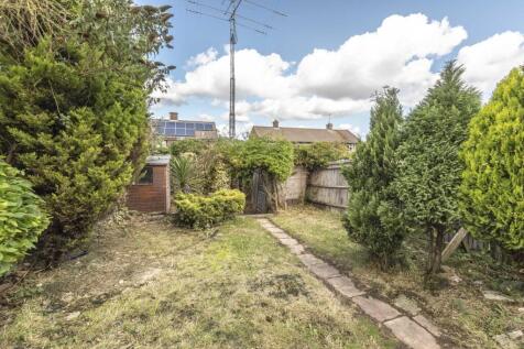 Private rear garden with a lawn, mature hedges ...