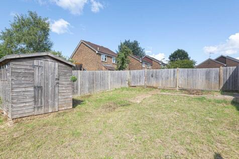 Sunny private rear garden with lawn, timber she...