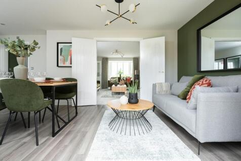 The lounge and kitchen/dining area are connected with double doors, perfect for entertaining