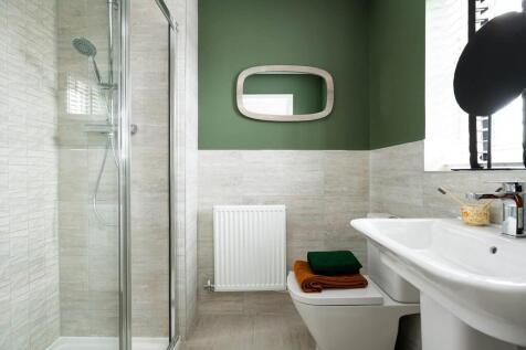 The main bedroom also hosts a private en-suite