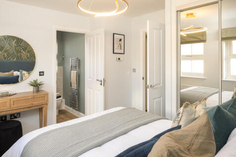 Internal image of the main bedroom and en suite in the archford at niveus walk