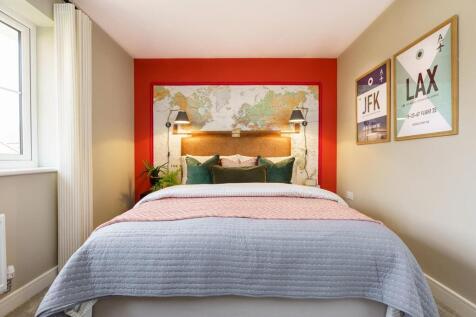 A large double bedroom with views over the garden