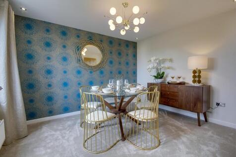 The dining area provides an inviting space to entertain friends