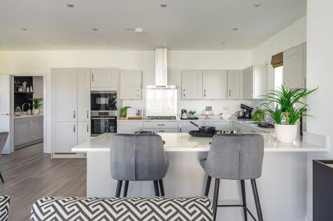 This spacious kitchen is the social hub of the home