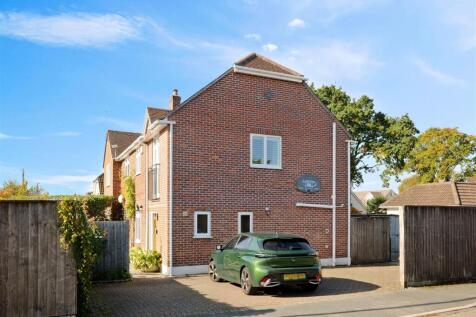 Side of property with parking