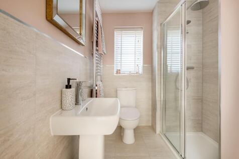 Bedroom two&#39;s en suite is ideal for guests or resident teenagers