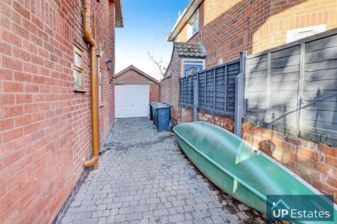 Side of house driveway