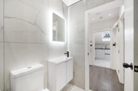Stylish 2-Bed Loft Apartment Near Mortlake Statio