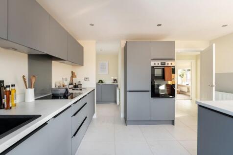 The separate utility room helps you manage a busy home