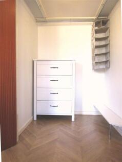 Huge walk-in wardrobe in bedroom.jpeg