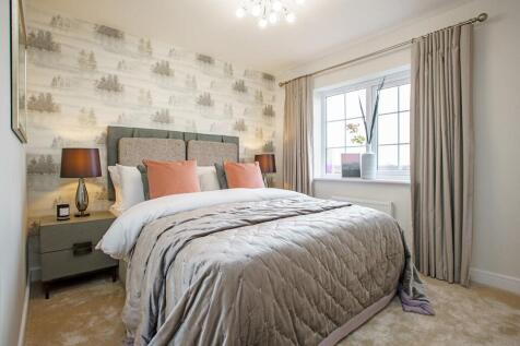 A large double bedroom with en suite