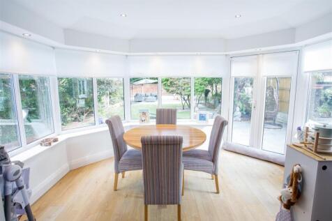 CONSERVATORY WITH SOLID ROOF