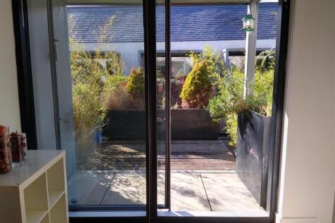 FIRST FLOOR PATIO DOORS TO DECKING AREA