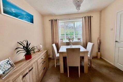 Living Room &amp; Dining Area:
