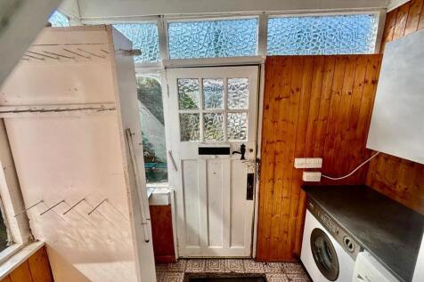 Rear Porch / Hallway / Utility Area:
