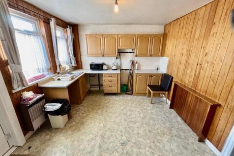 Entrance Dining Kitchen: