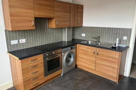 Open Plan Living Room / Fitted Kitchen: