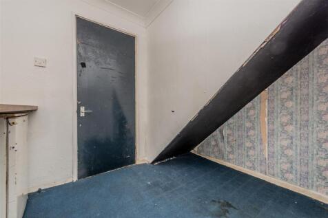 Utility Area / Storage Cupboard: