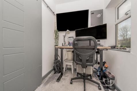 Converted Office / Storage Room: