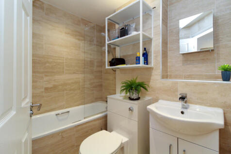 Electric shower over bath