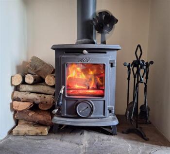 Log Burner in Dining Room