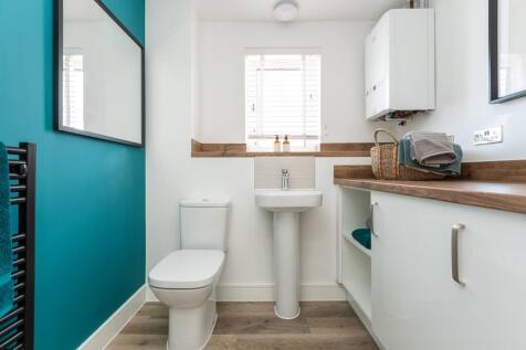 Downstairs WC with utility, keeping the washing machine out of sight